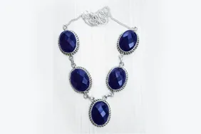 Blue gemstone necklace before colour editing