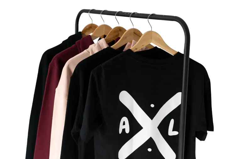 Product photo editing example: clothes on a rack isolated on white